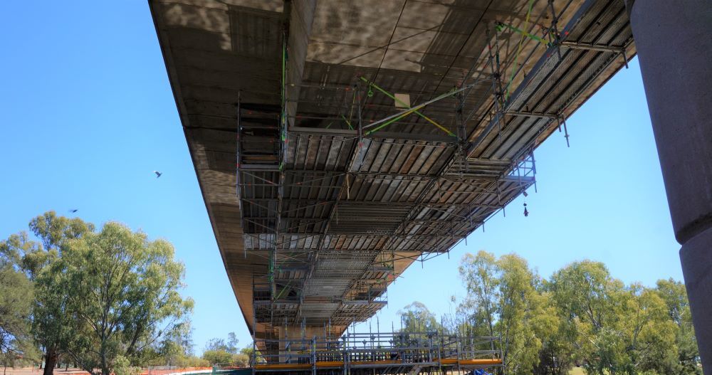 Scaffolding Below Concrete Bridge