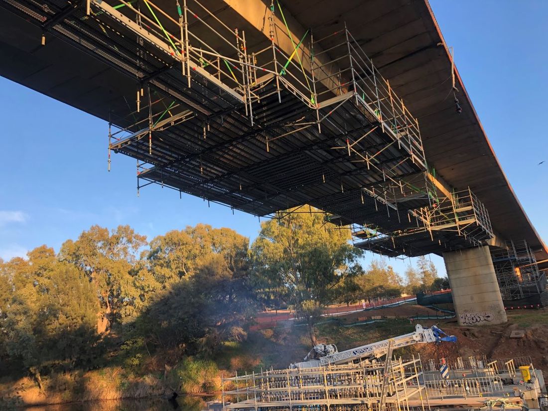 Scaffolding Anchored into Concrete Bridge